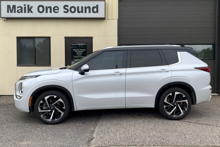 Grey 2024 Mitsubishi Outlander SUV with premium ceramic window tint